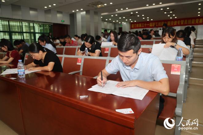 91名劳资专管员同场竞技。人民网记者 陈博摄