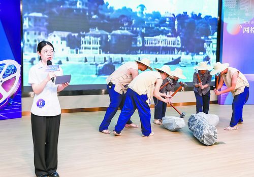 高殿社区表演节目《建堤育人——无畏无惧的海堤建设者陈太平》。